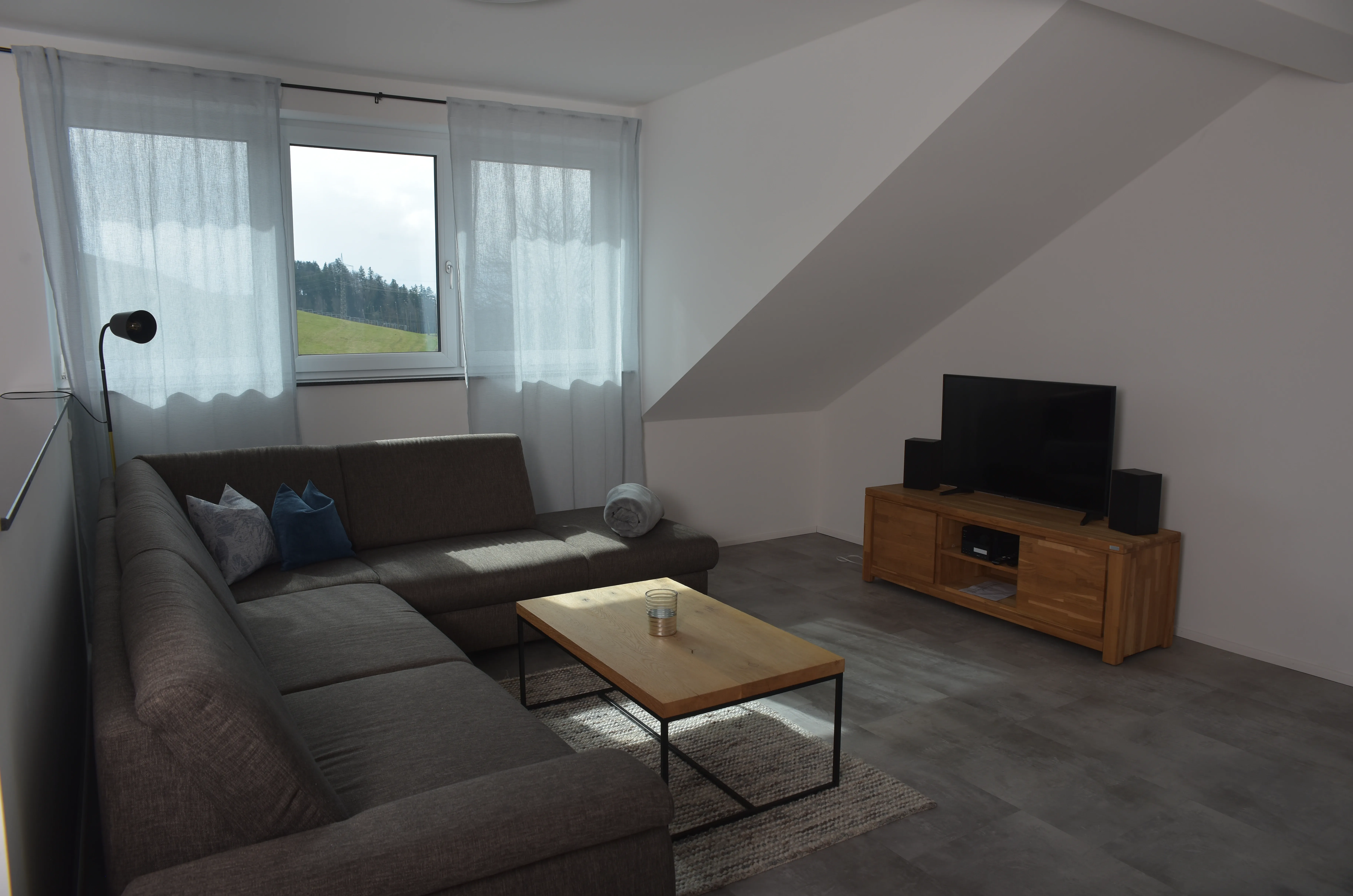 Das Wohnzimmer der Wohnung Auf'm Traktor